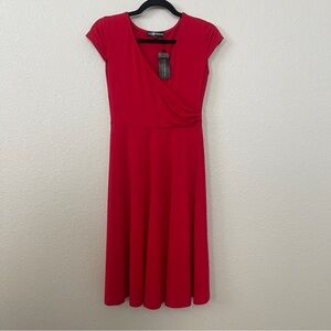Women’s true red dress size small new with tags. V-neck